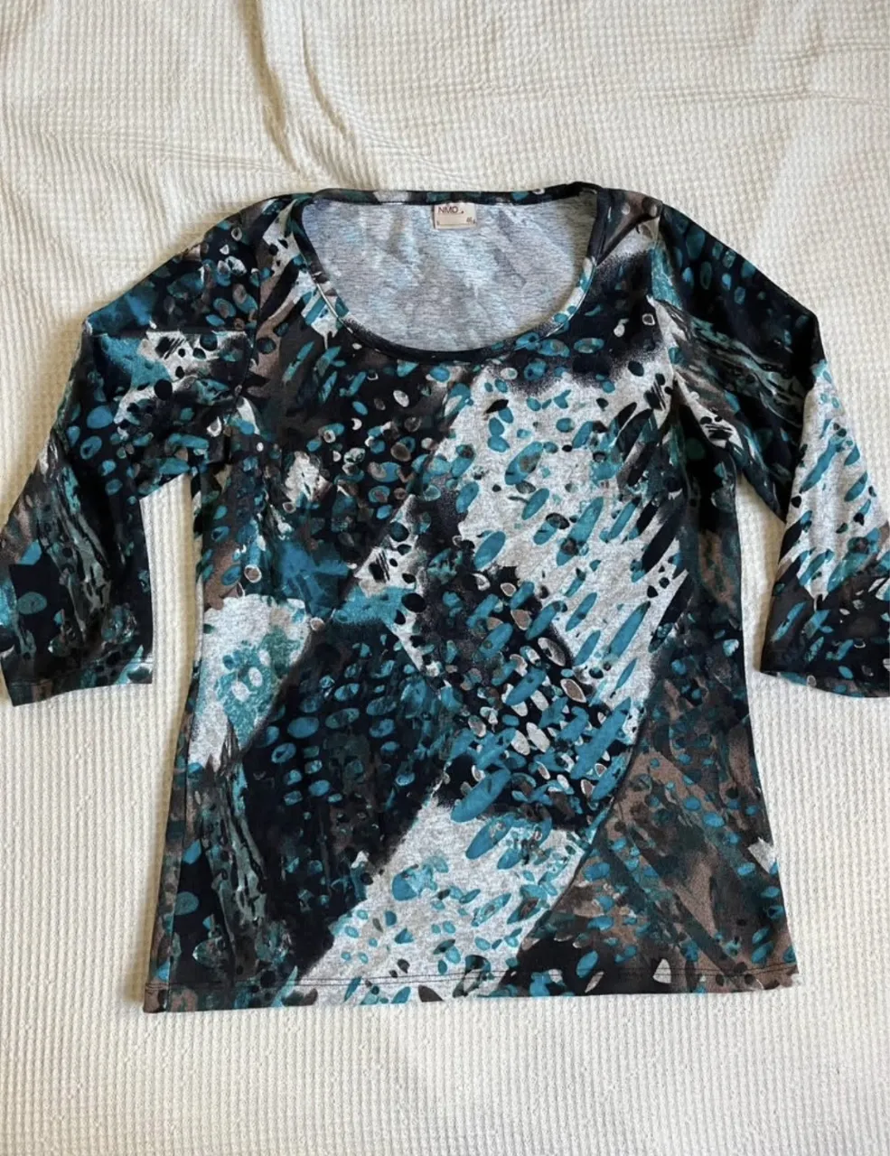 Remera NMD · Talle L
