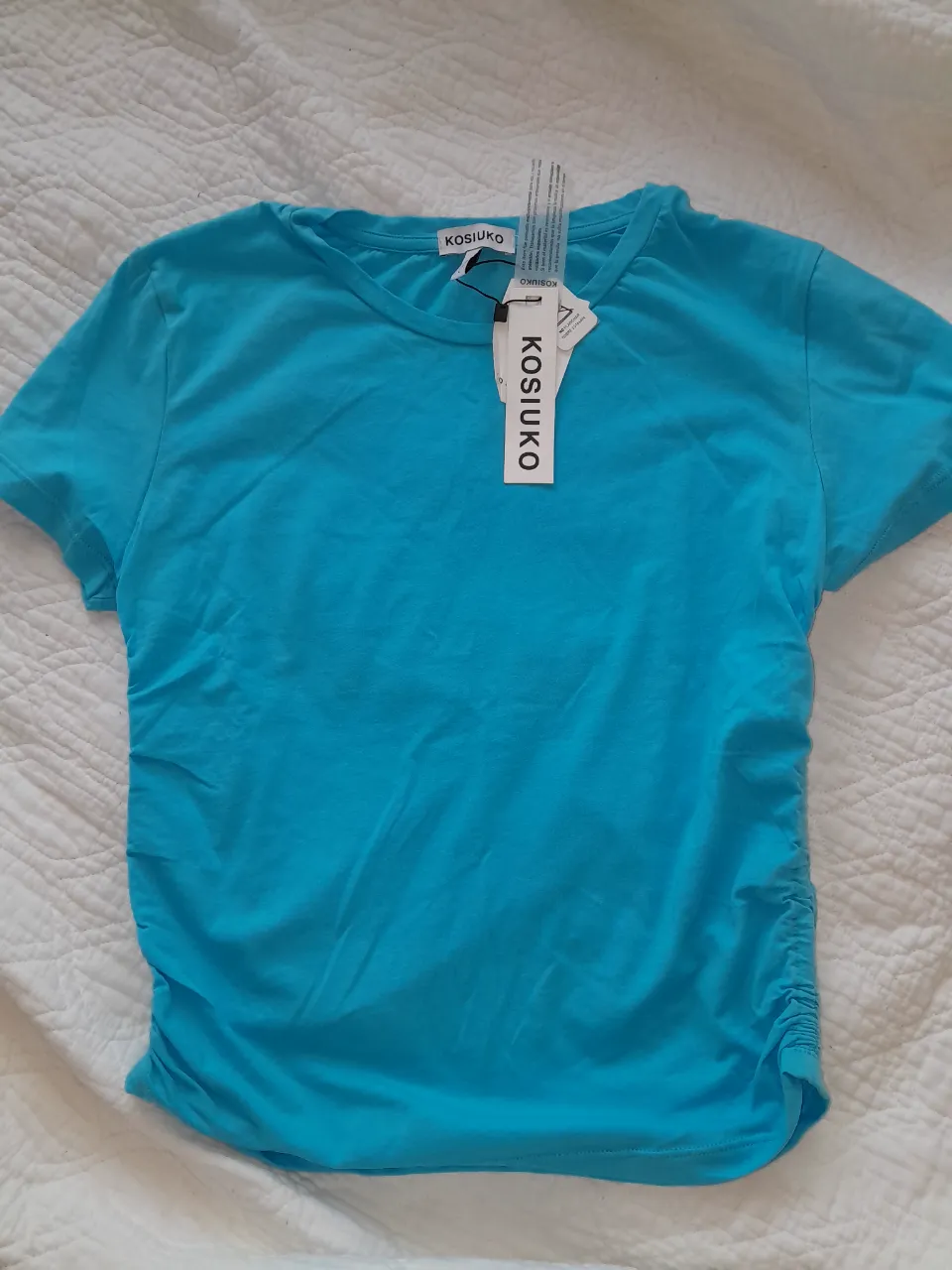 Remera Kosiuko · Talle L