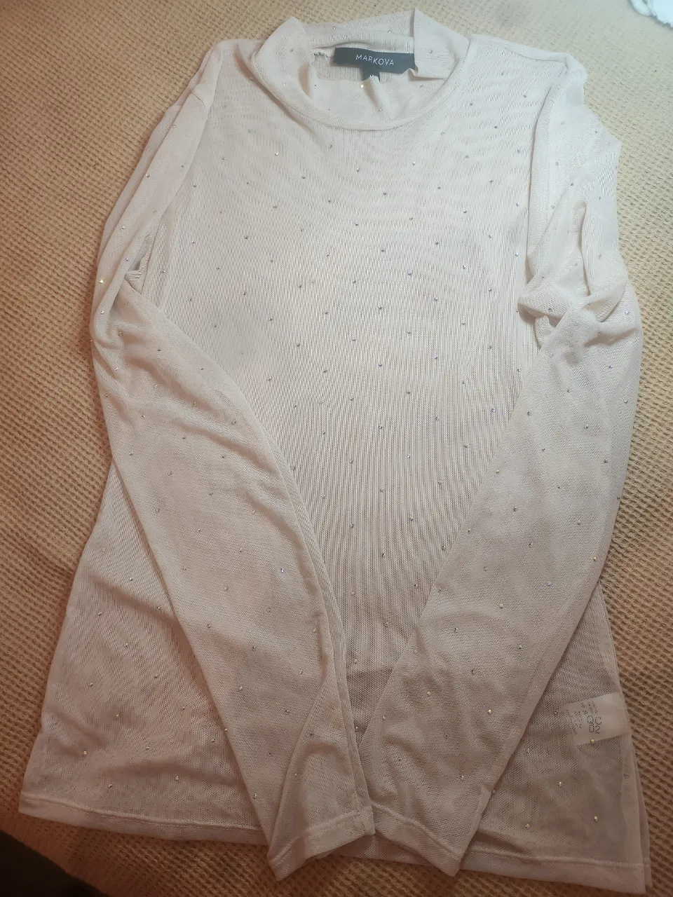 Remera Markova · Talle M