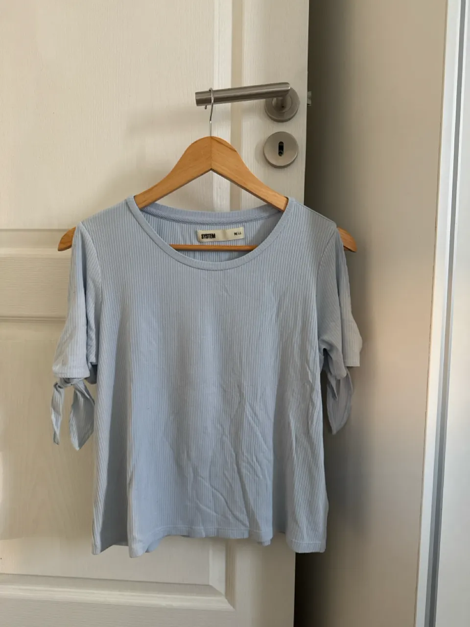 Remera System · Talle M