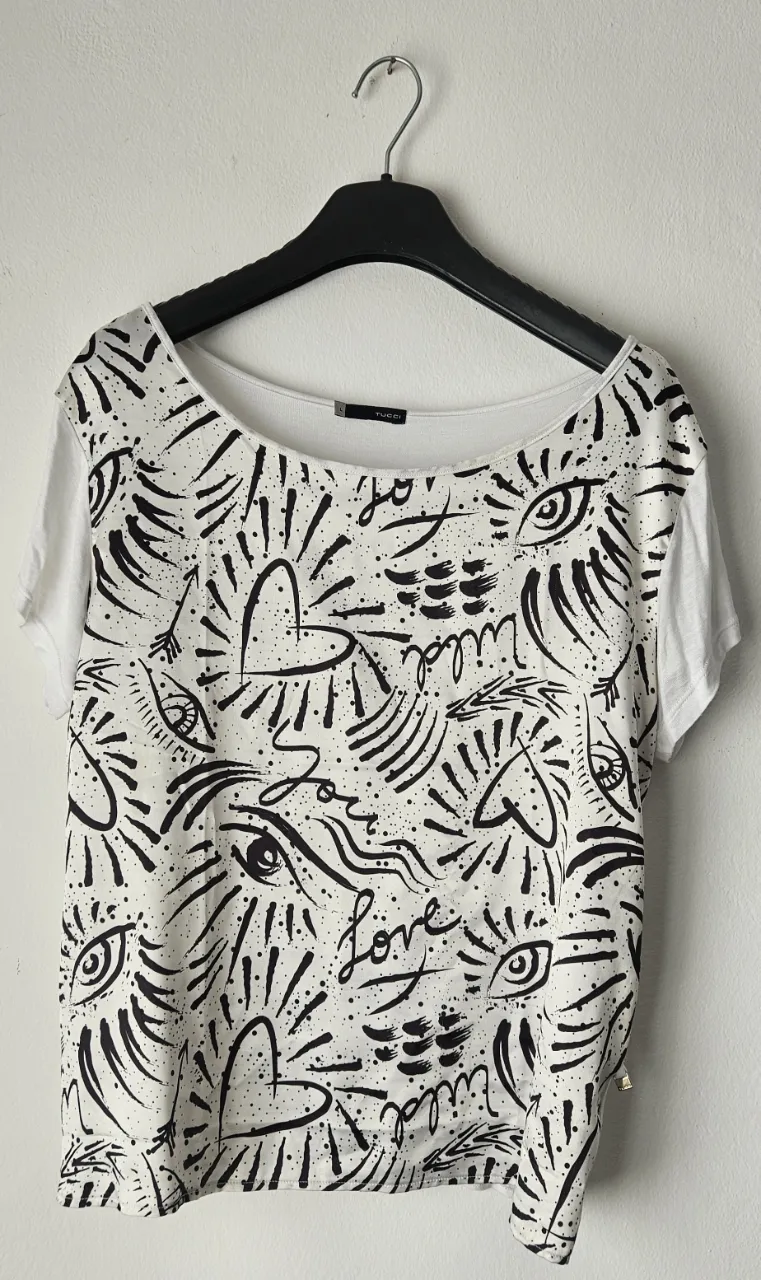 Remera Tucci · Talle L