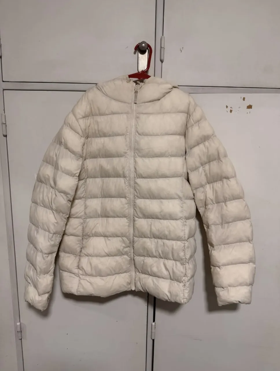 Campera de plumas Uniqlo · Talle 13 años / 158 cm