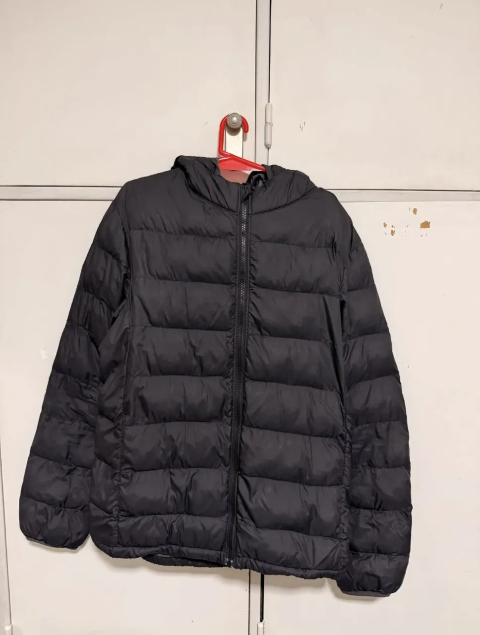 Campera de plumas Uniqlo · Talle 13 años / 158 cm
