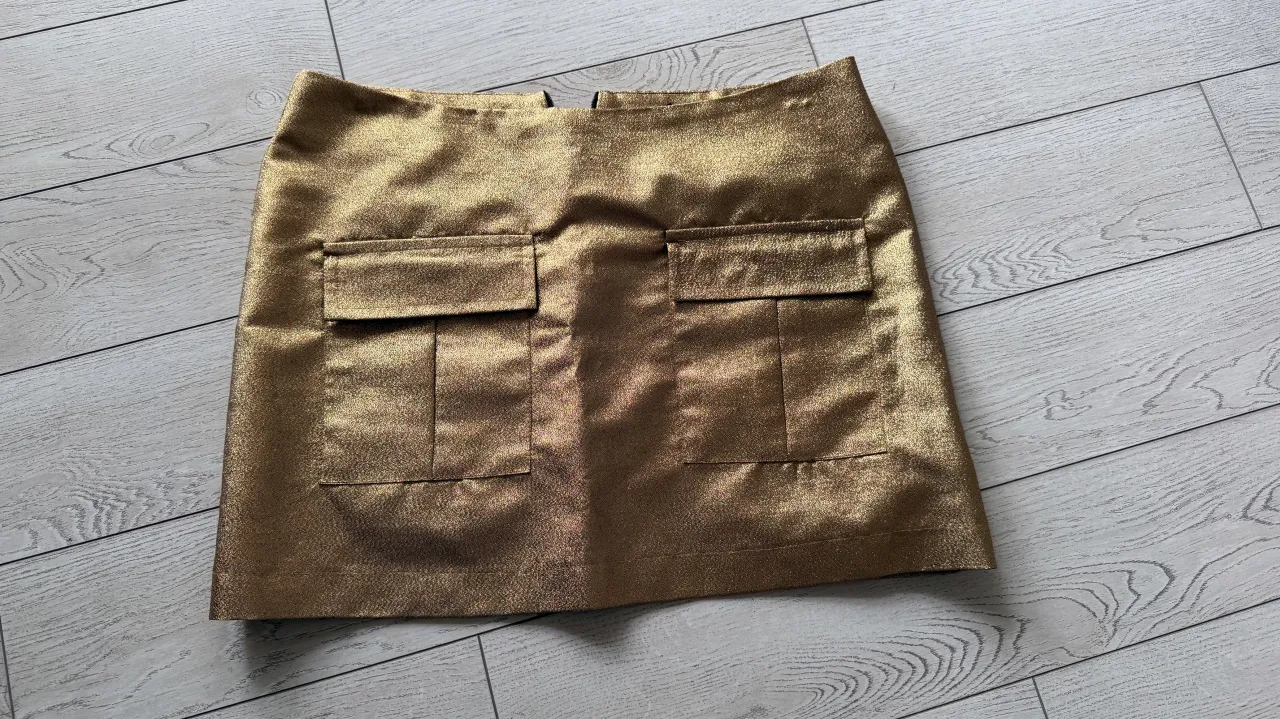 Minifalda Kosiuko · Talle L