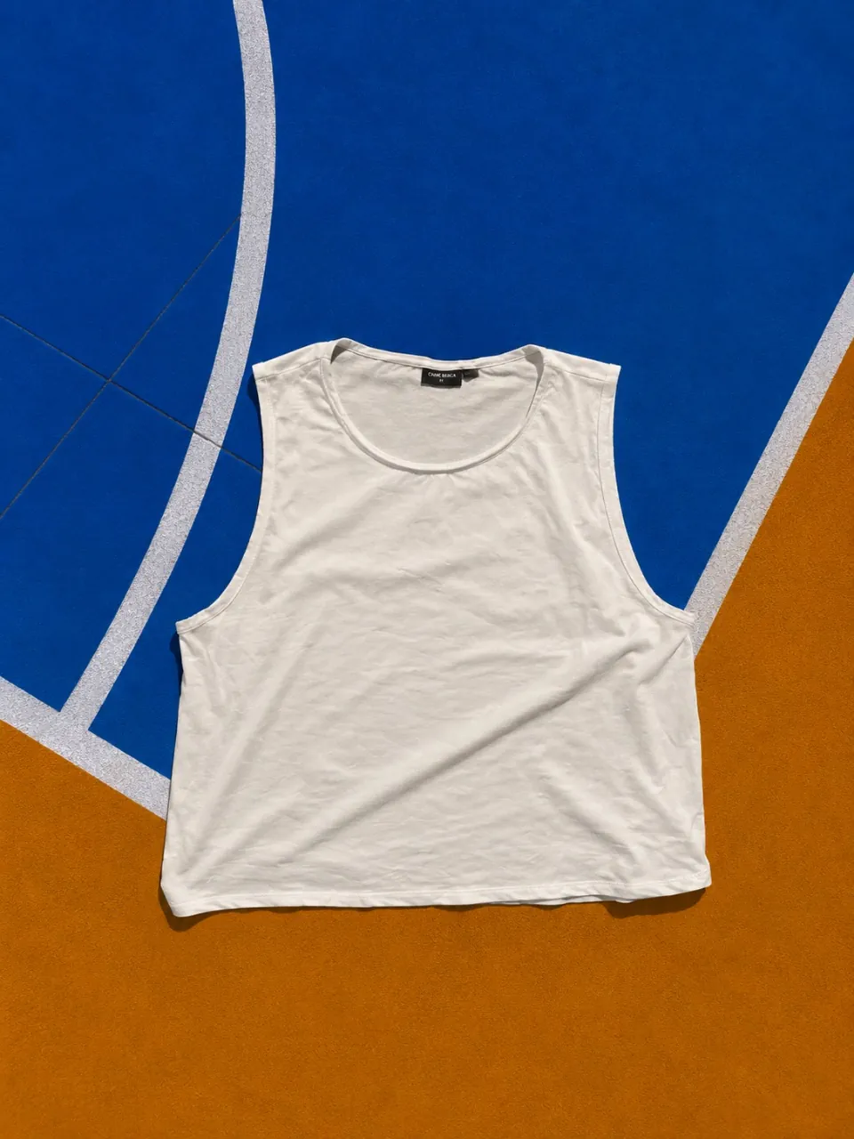Musculosa crane · Talle M