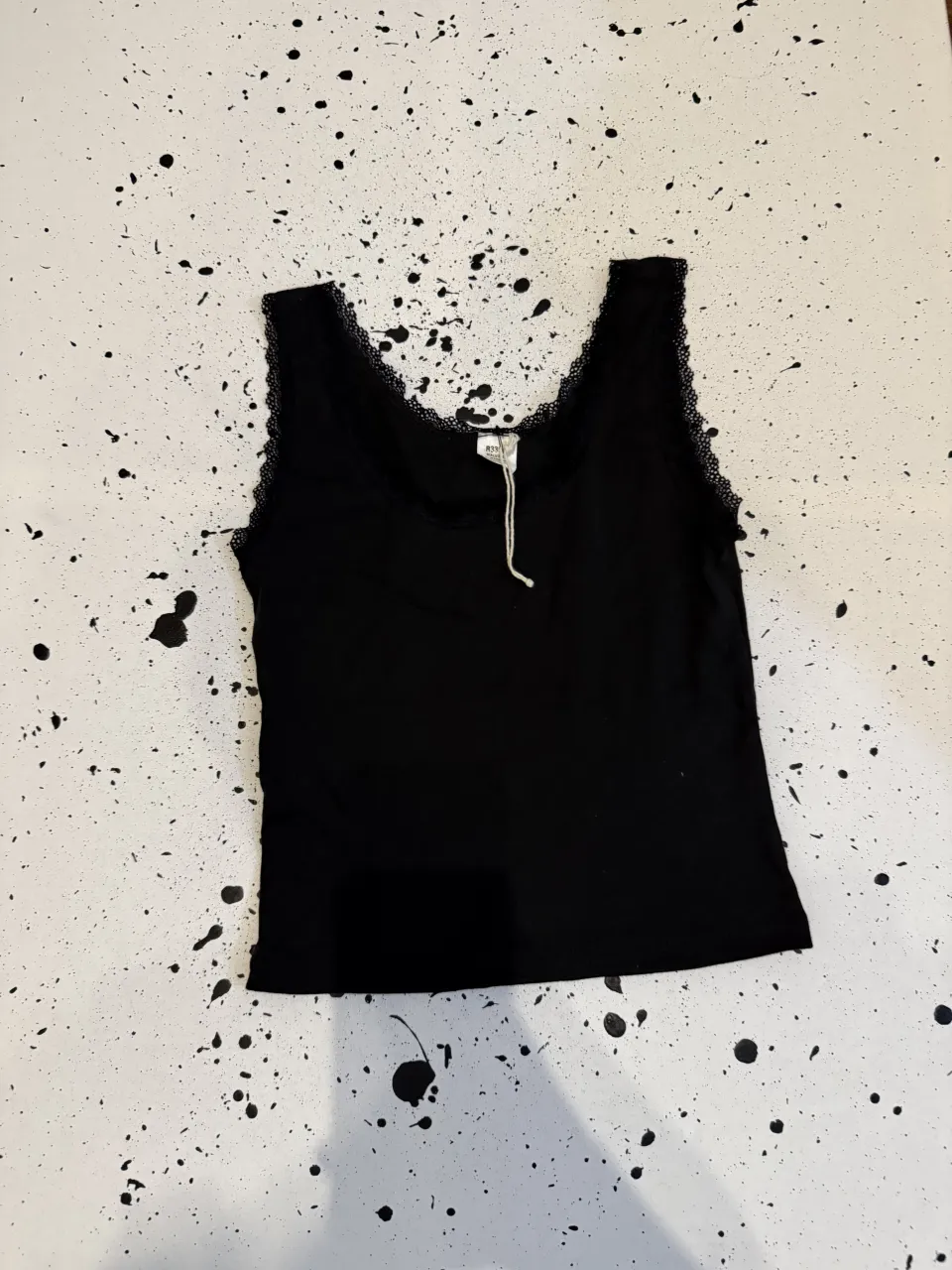 Musculosa A ≠ · Talle S