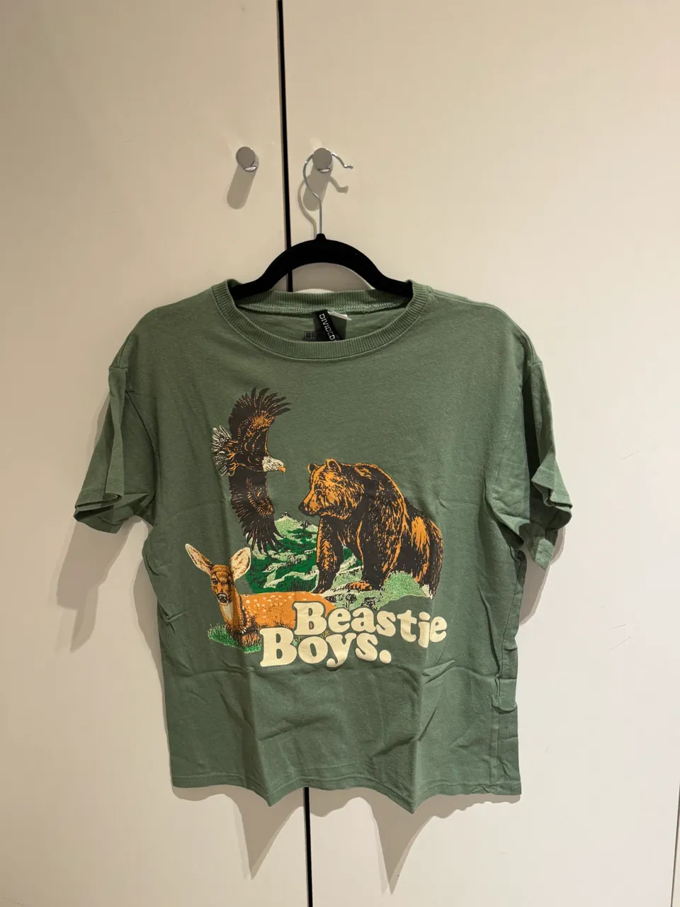 Remera H&m divided - imagen 1