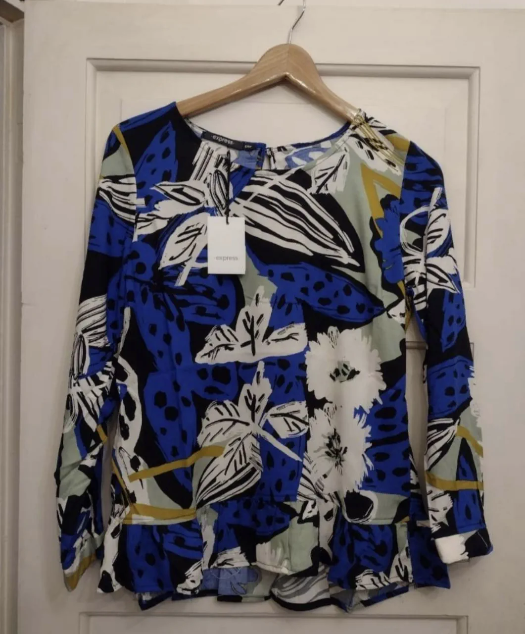 Blusa Express · Talle L
