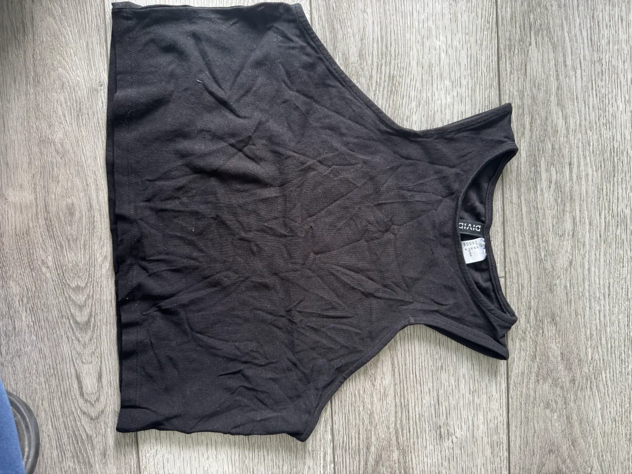 Musculosa Divided - imagen 1