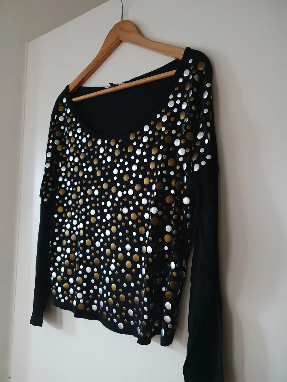 Remera motivi · Talle L