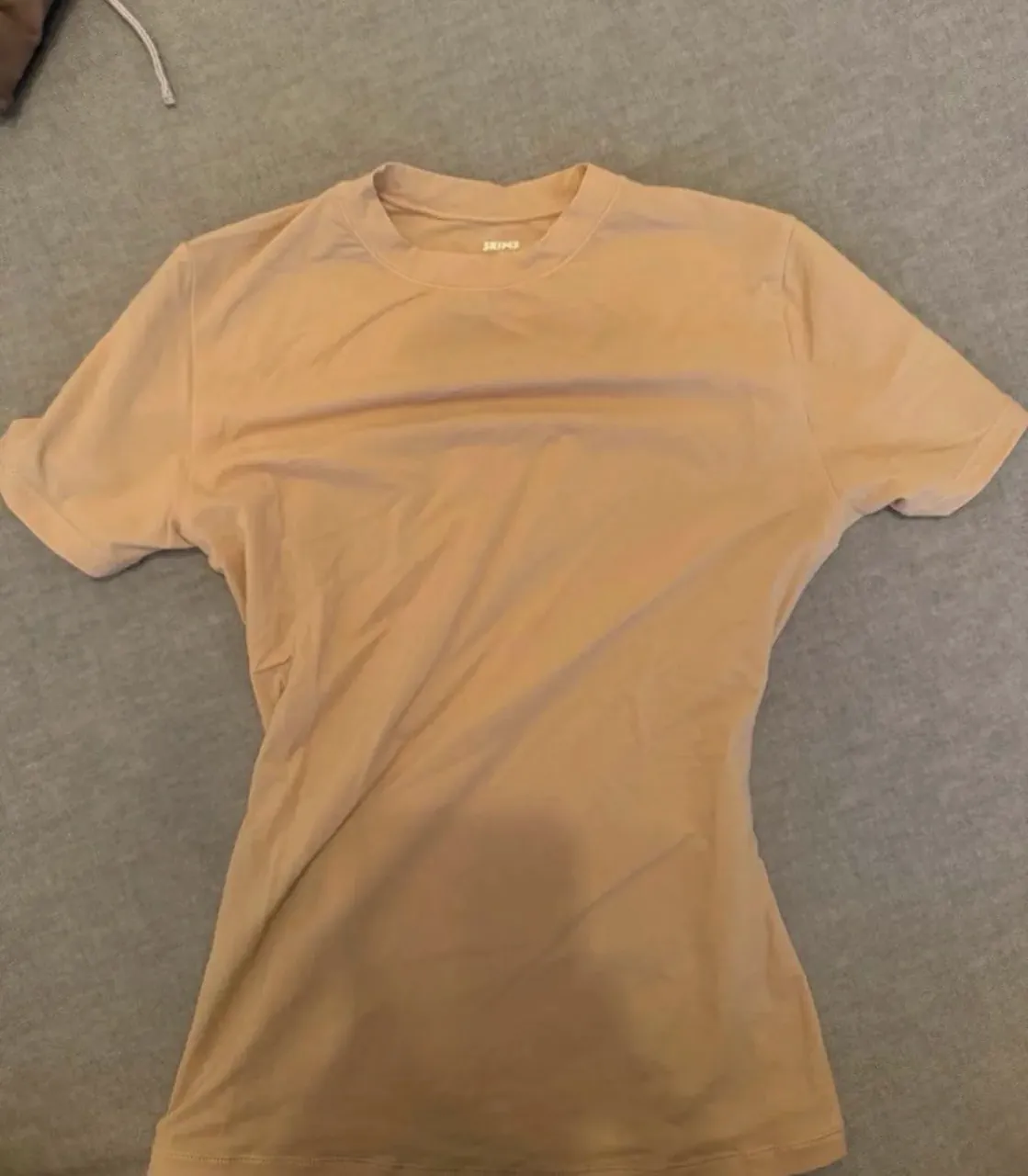Remera Skims · Talle XS