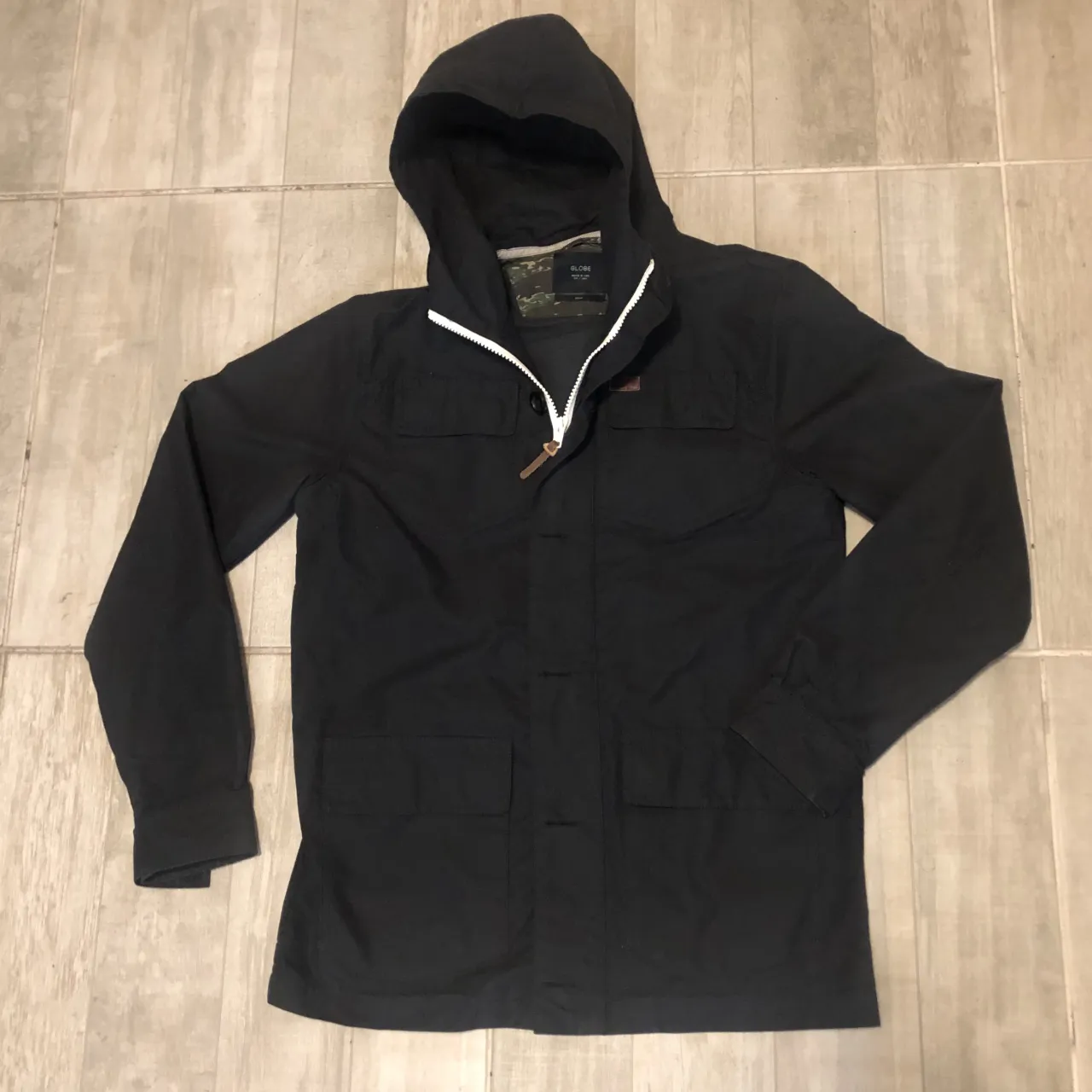 Campera Globe · Talle M
