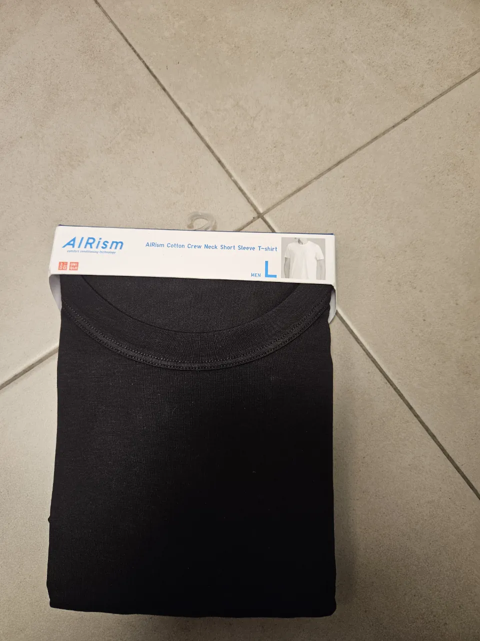 Remera Uniqlo · Talle L