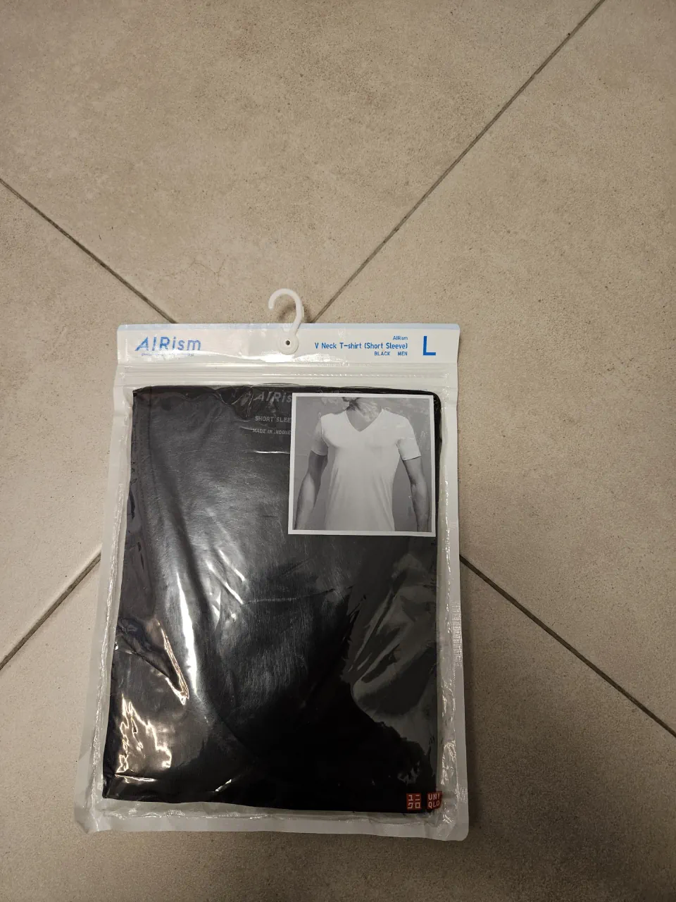Remera Uniqlo · Talle L