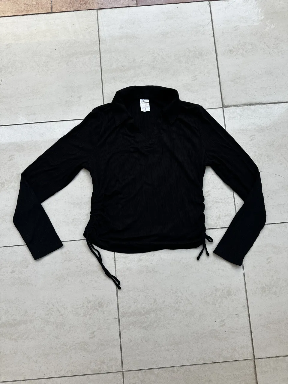 Remera A ≠ · Talle L