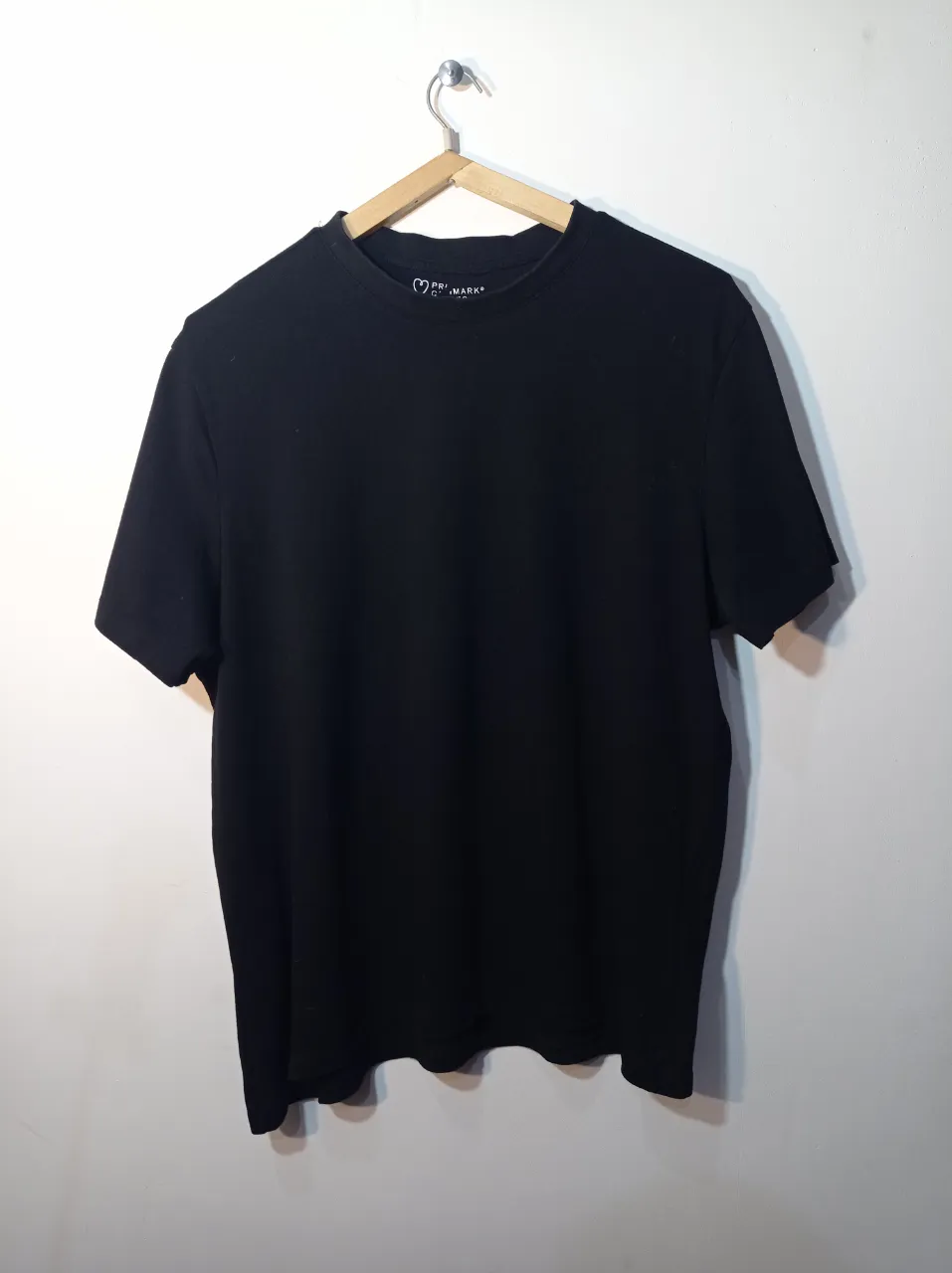Remera Primark · Talle L