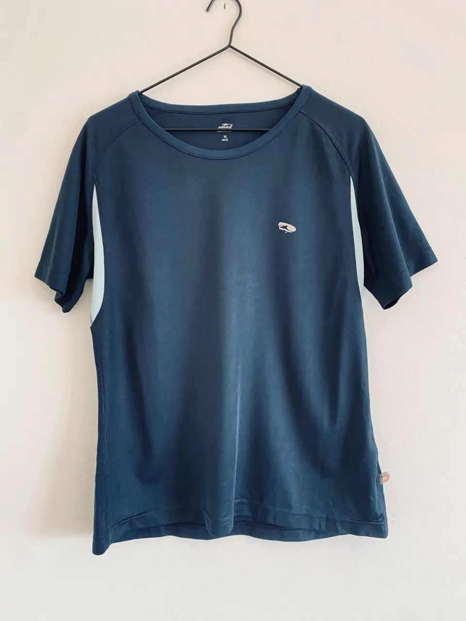 Remera crane · Talle M
