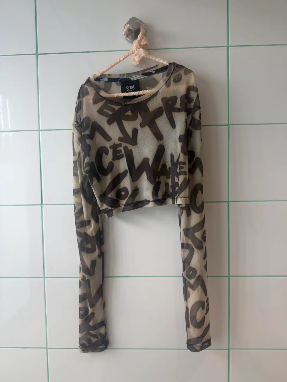 Remera Complot - imagen 1