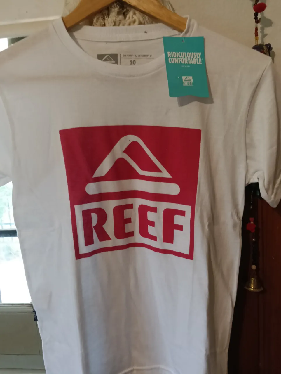 Remera Reef · Talle S