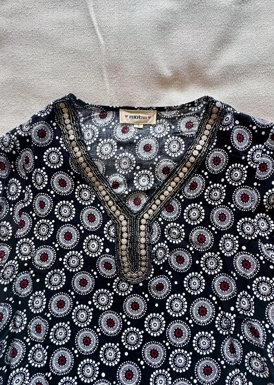 Blusa motivi - imagen 1