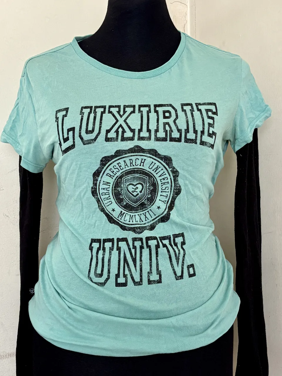 Remera Luxirie · Talle M