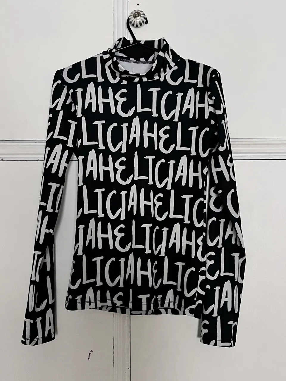 Remera Helicia · Talle L