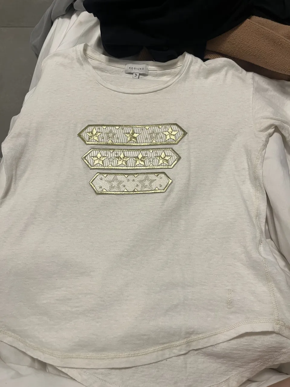 Remera Kosiuko · Talle L