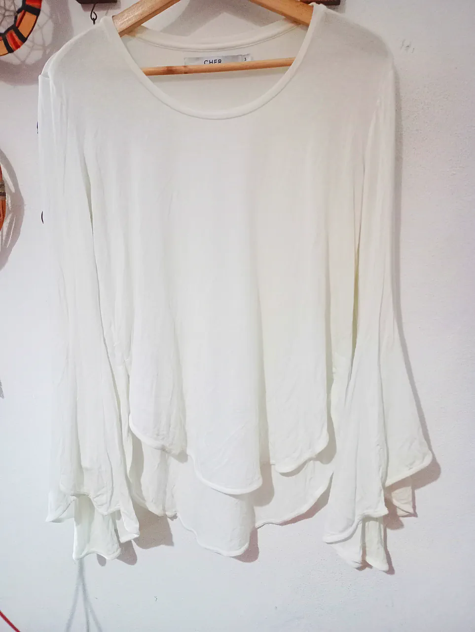 CHER. · Talle L