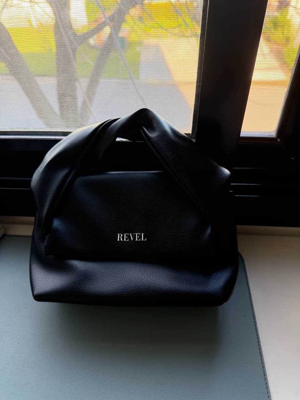 Cartera Revel