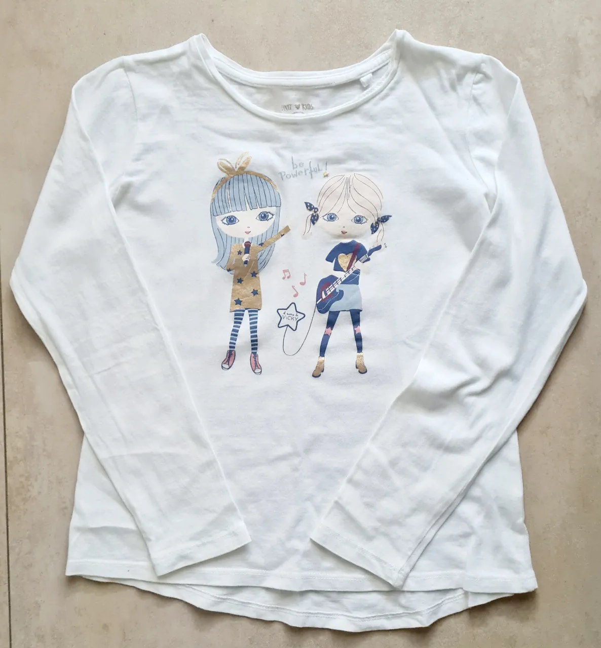 Remera Unit kids · Talle 9 años / 134 cm