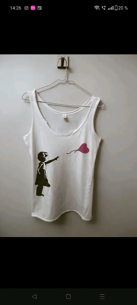 Musculosa A ≠ · Talle L