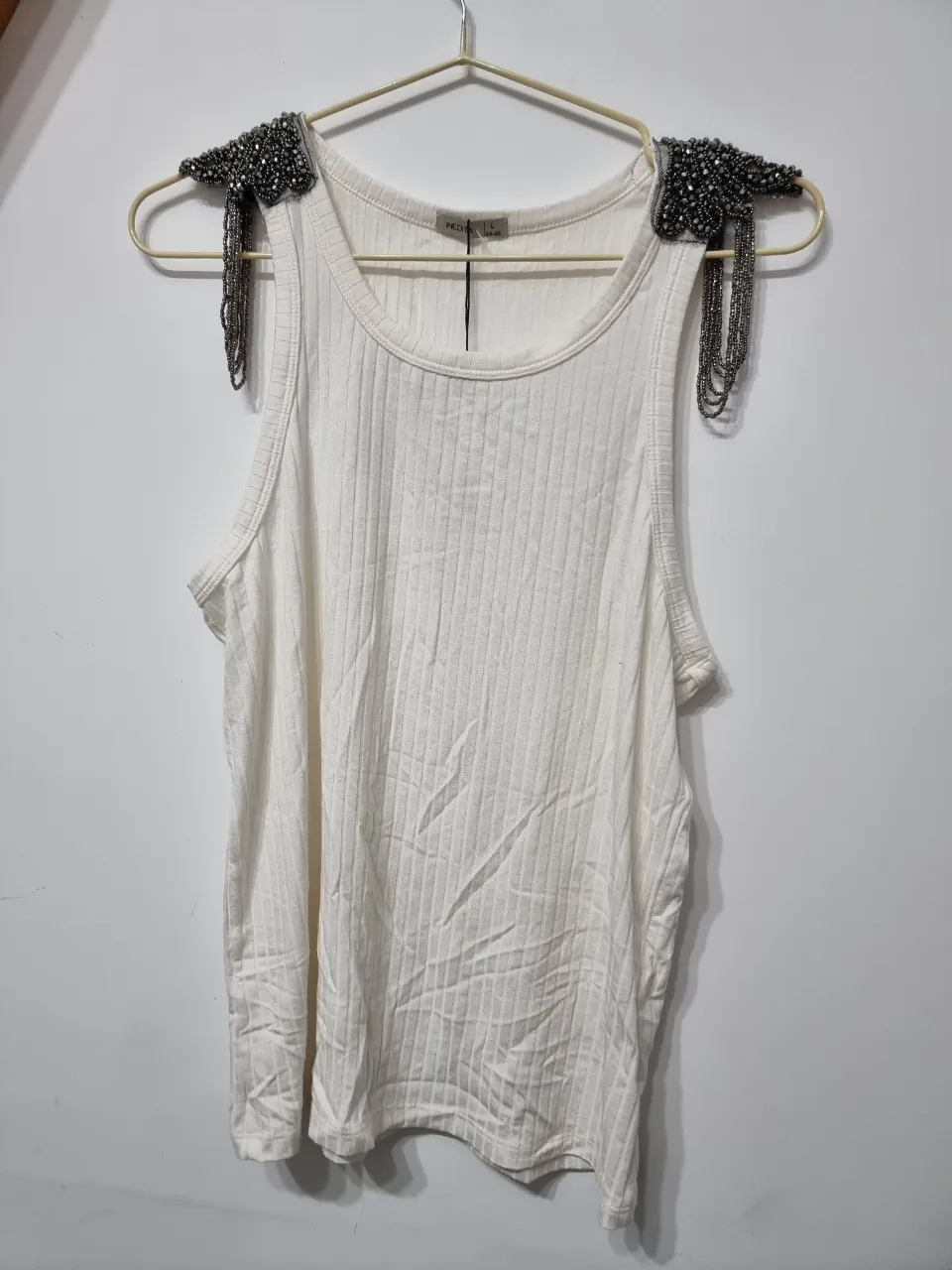 Musculosa Inedita · Talle L