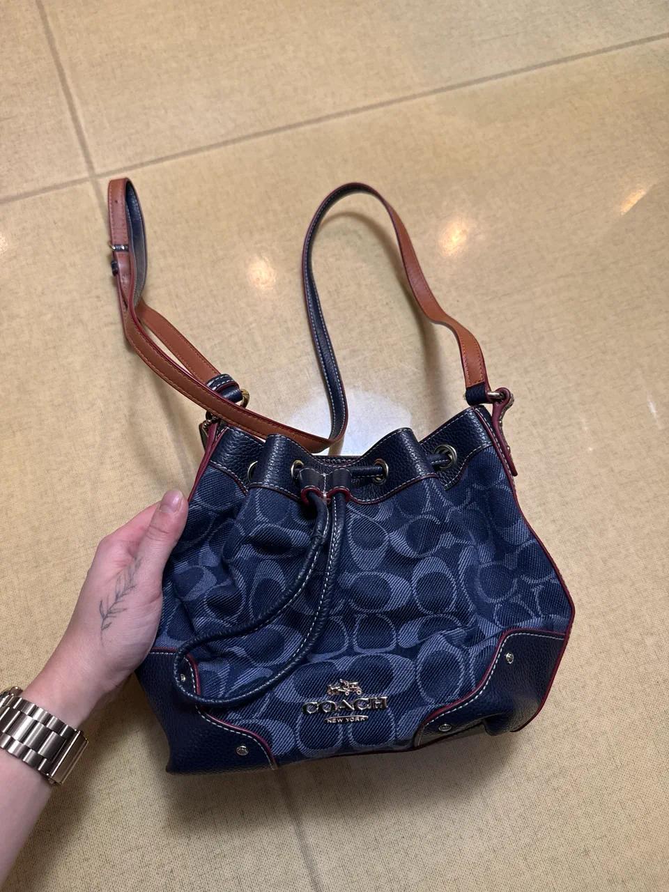Cartera Coach