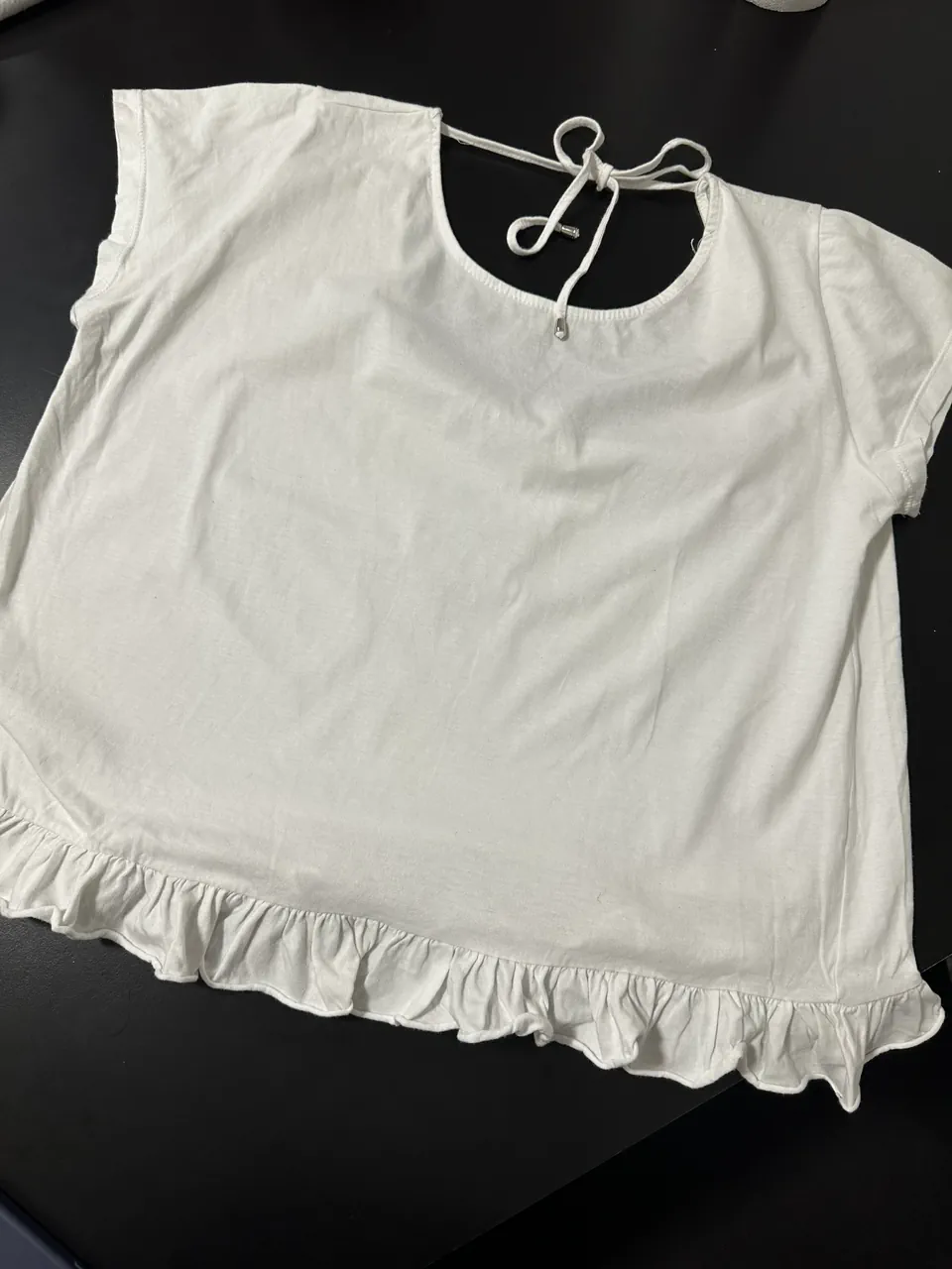 Remera Showroom · Talle M