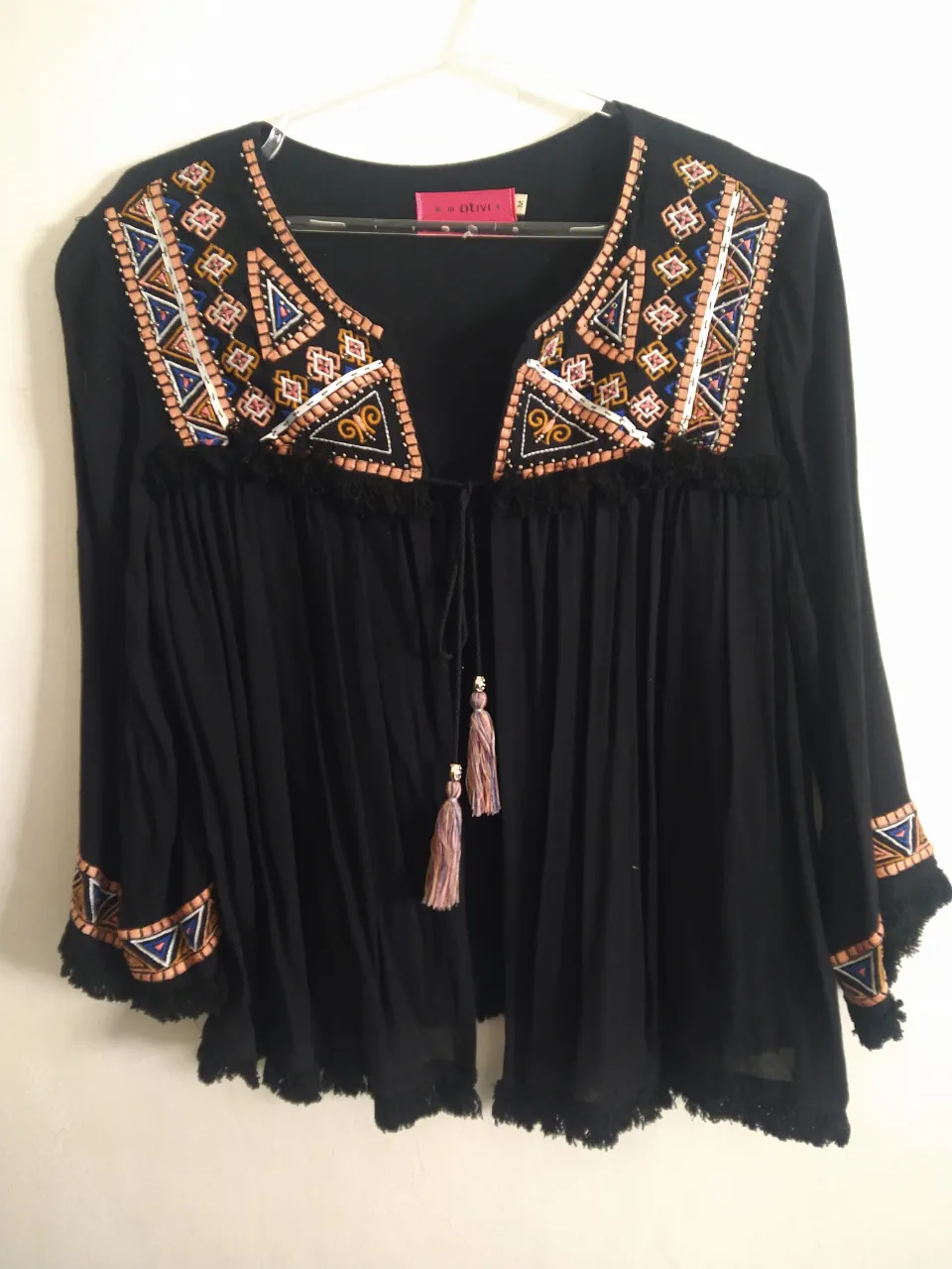 Blusa motivi · Talle M
