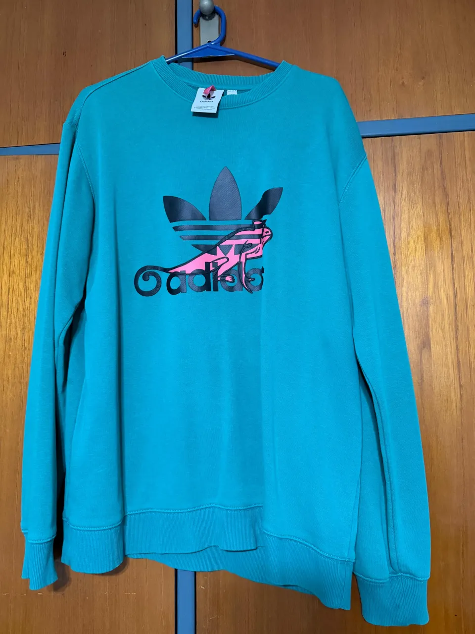 Buzo adidas · Talle M