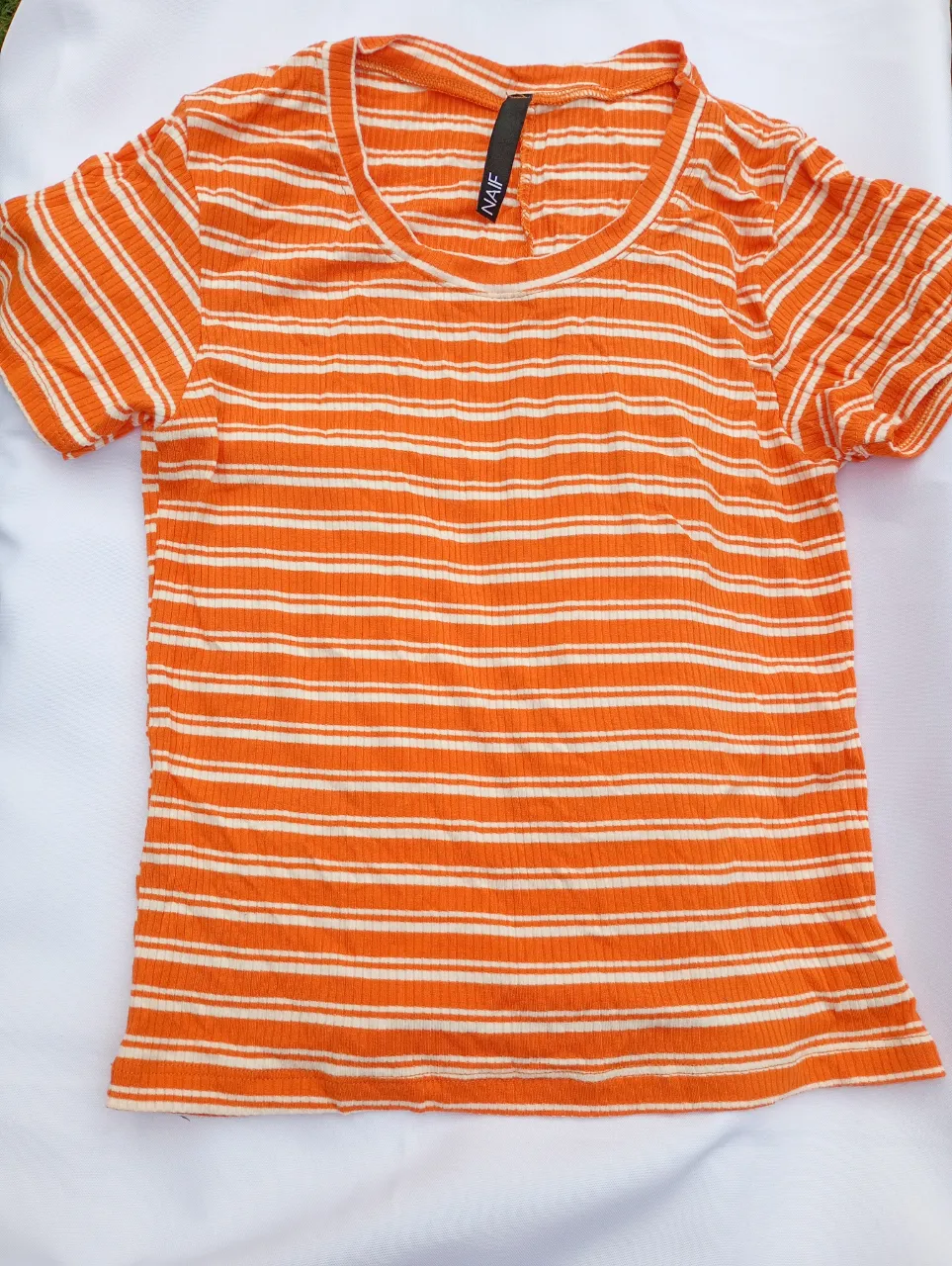Remera Naif · Talle único