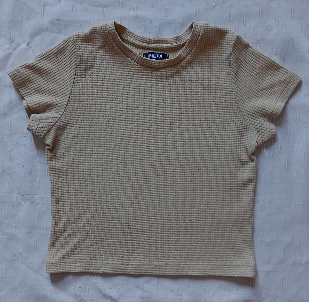Remera PIETA · Talle único