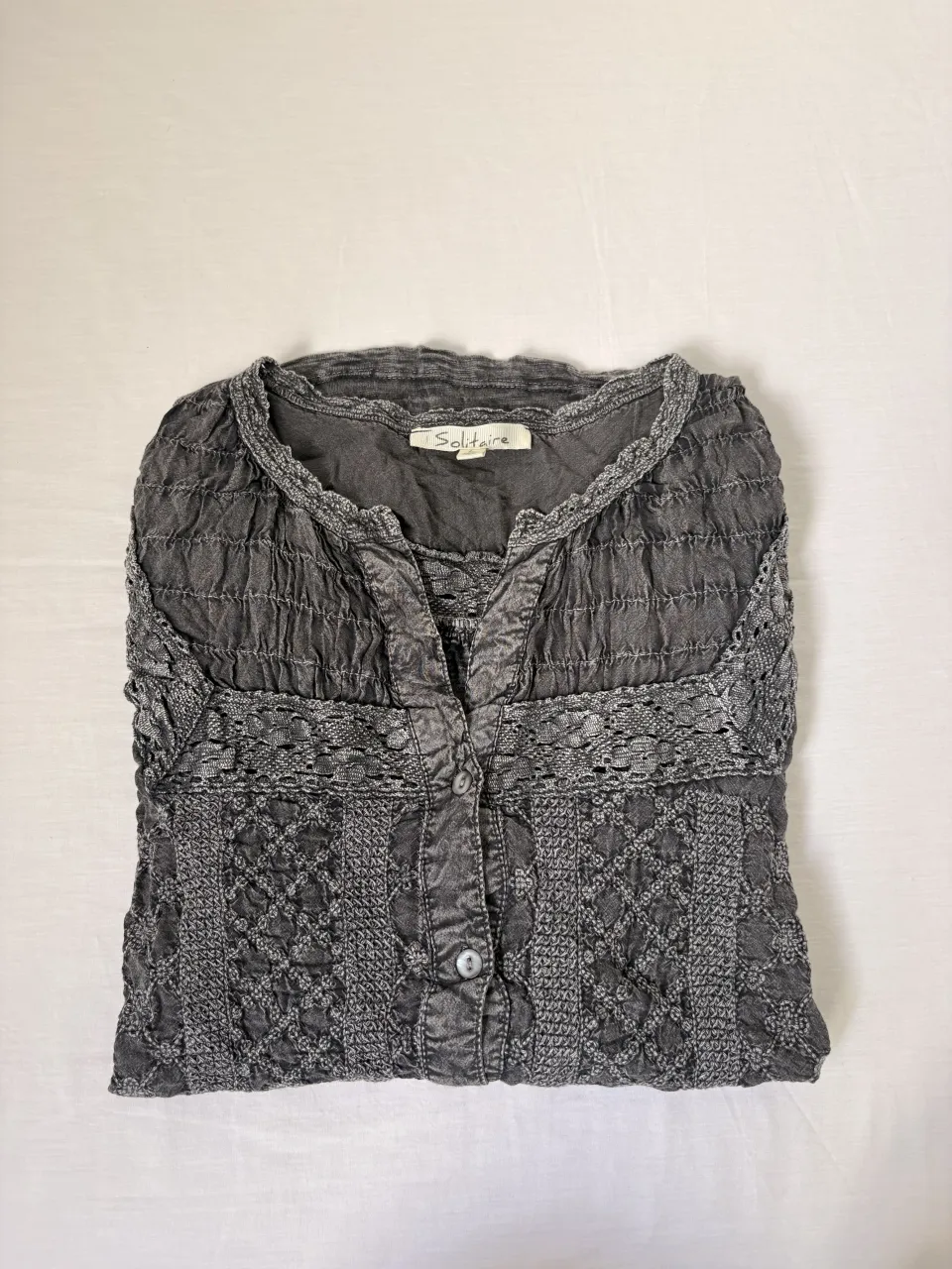 Remera SOLITAIRE · Talle L