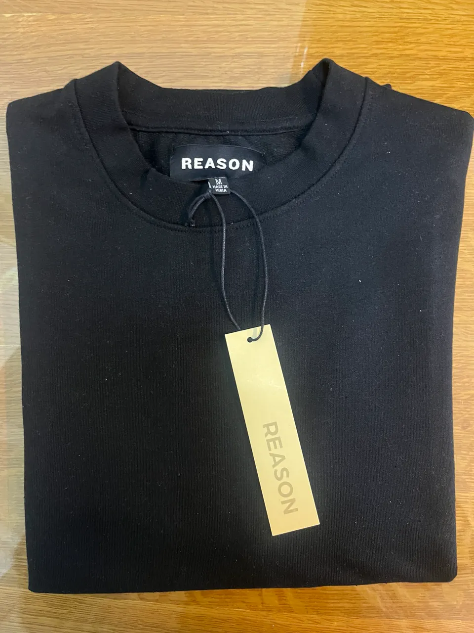Remera Reason · Talle M