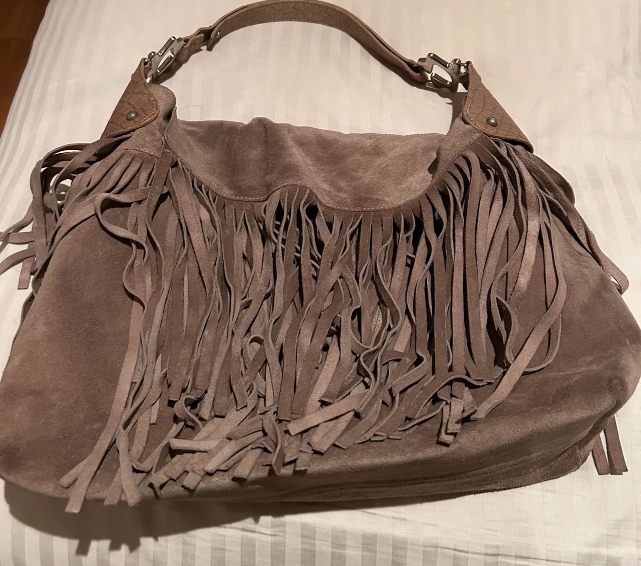 Cartera Ricky Sarkany