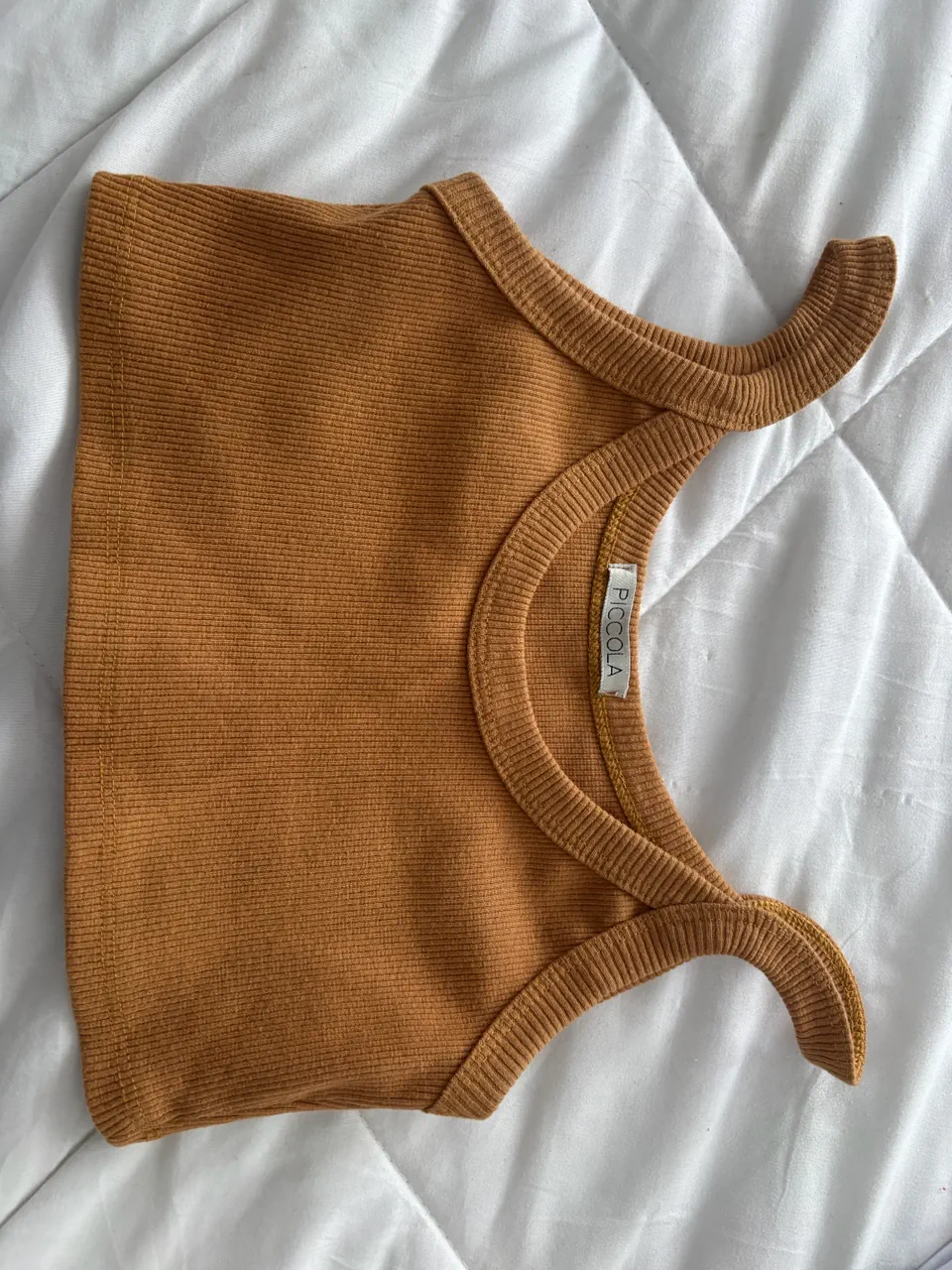 Musculosa Piccola · Talle M
