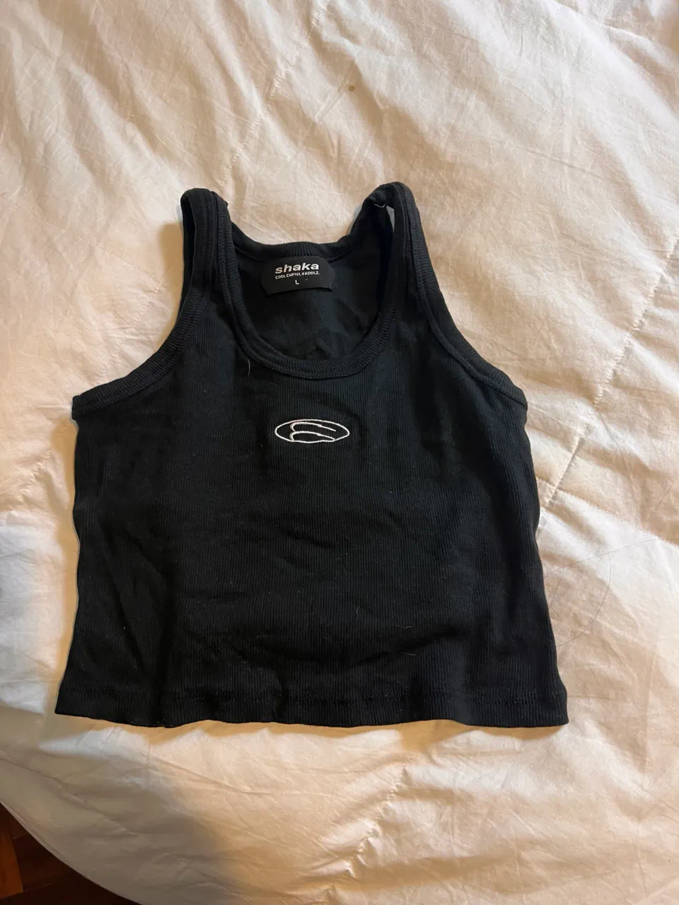 Musculosa Shaka · Talle L