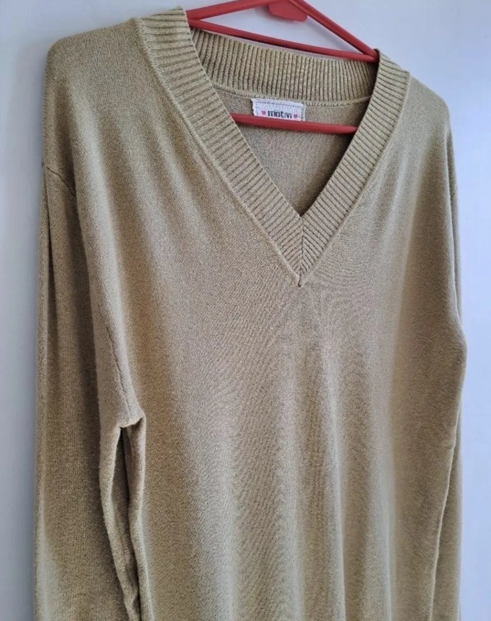 Sweater motivi · Talle M