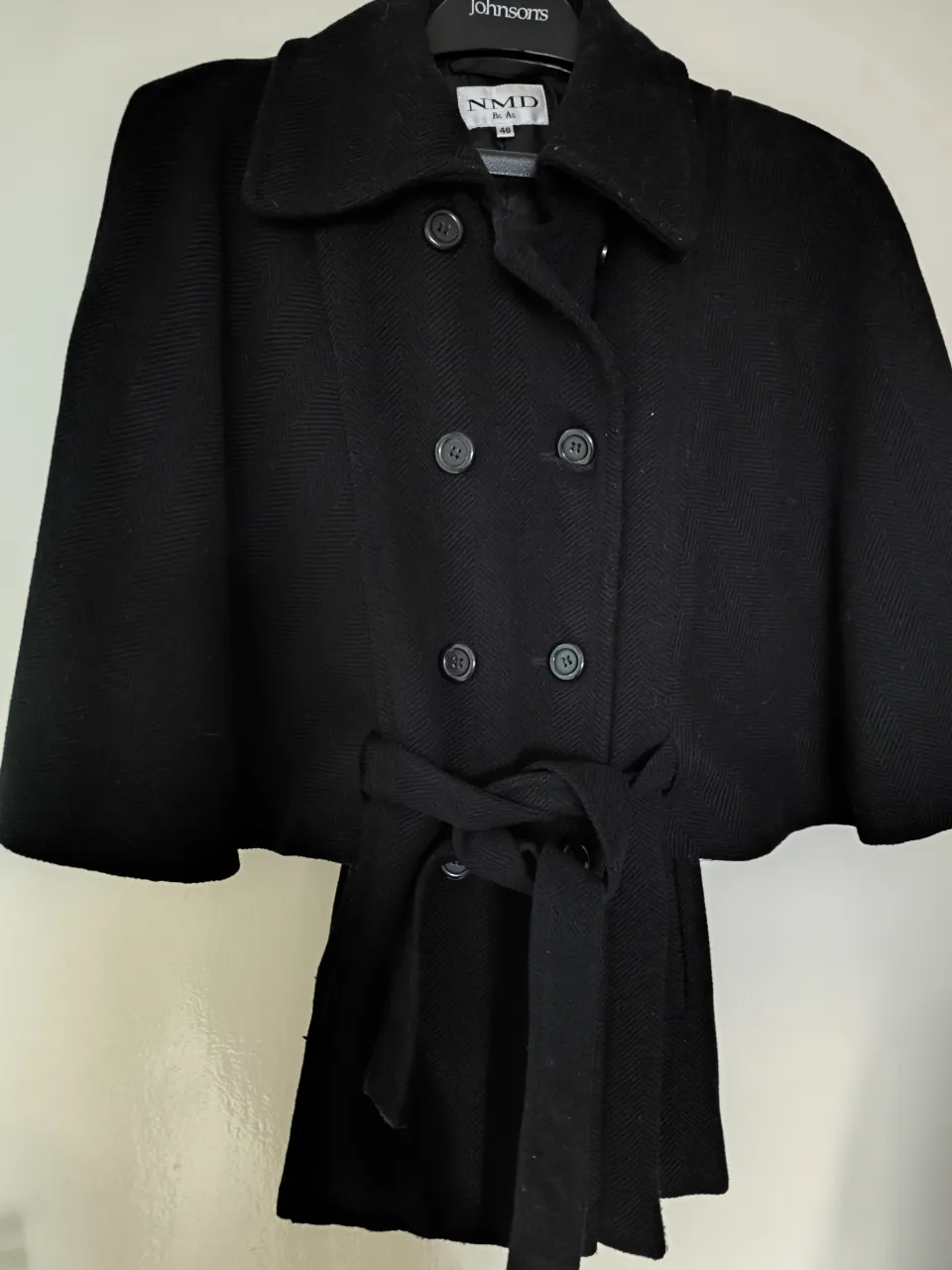 Capa NMD · Talle L