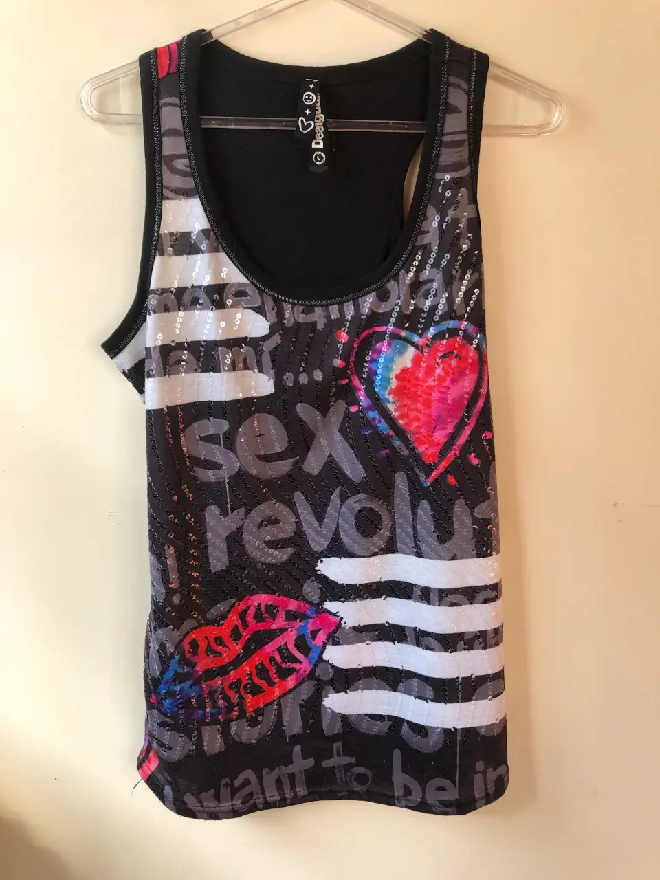Musculosa Desigual · Talle M