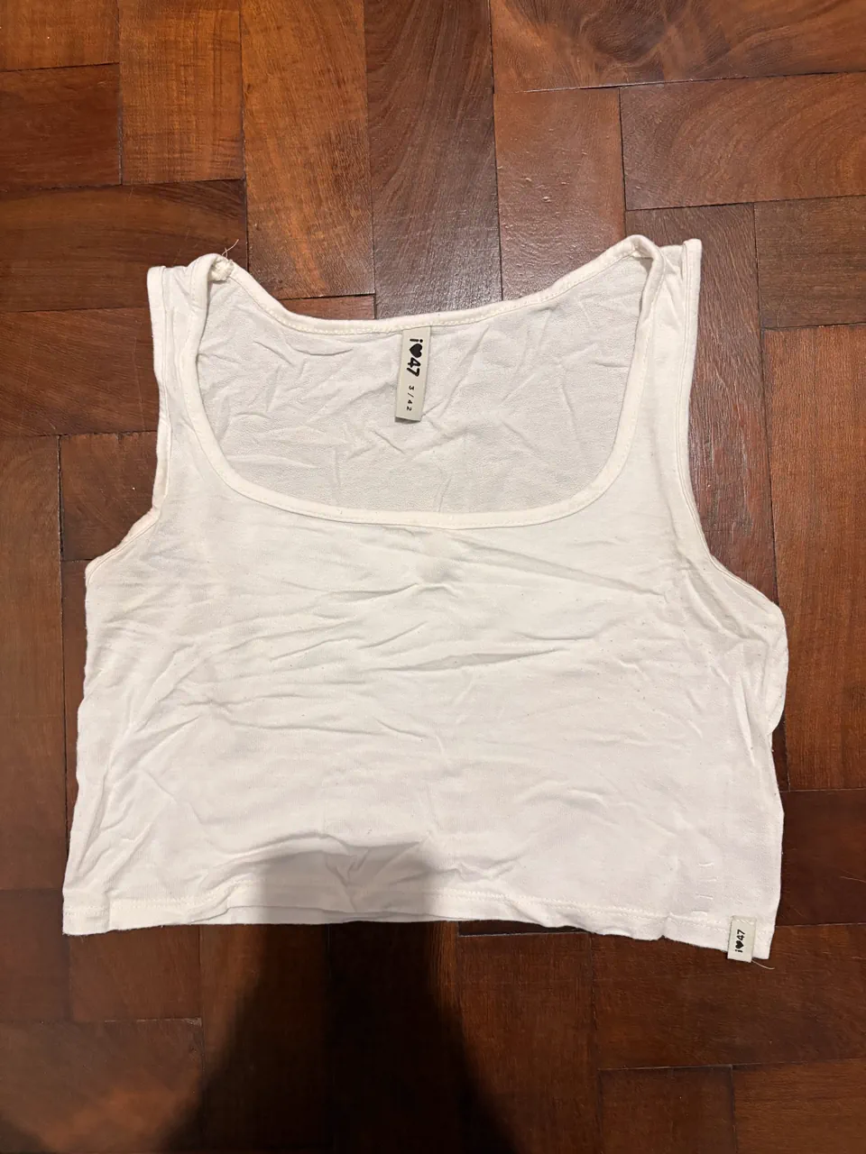 i47 · Talle XS
