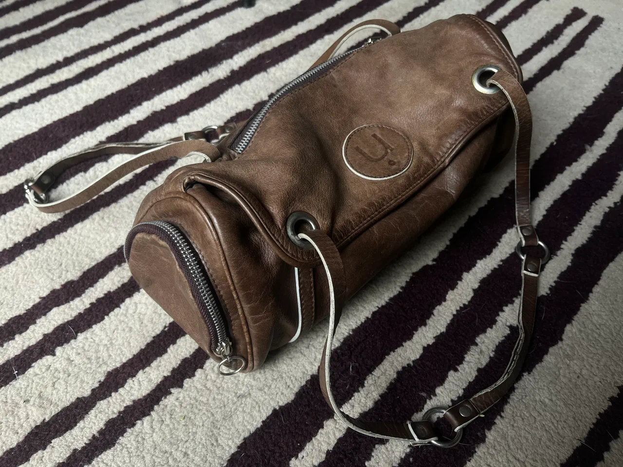 Cartera Uma - imagen 1
