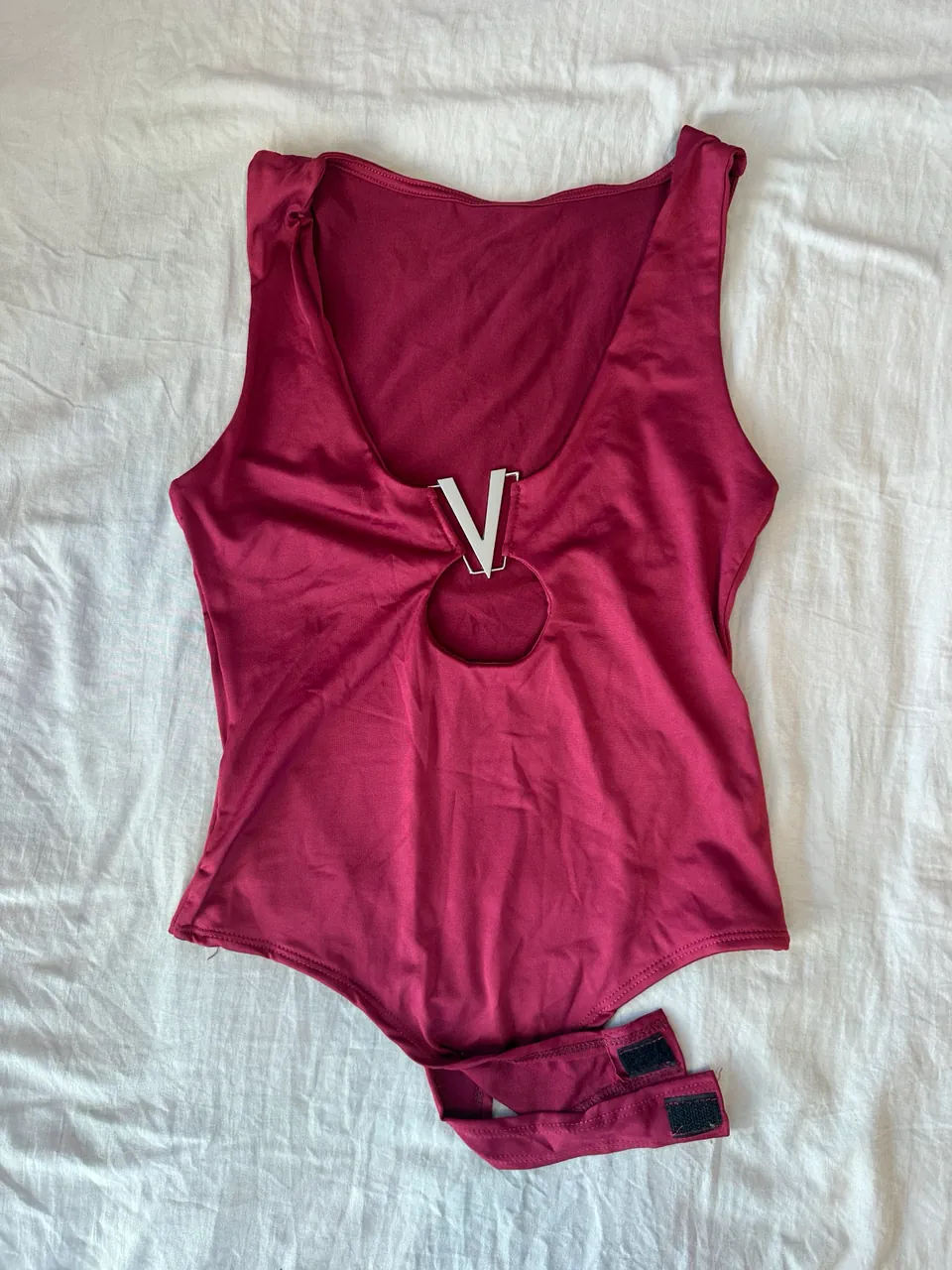 V. · Talle M