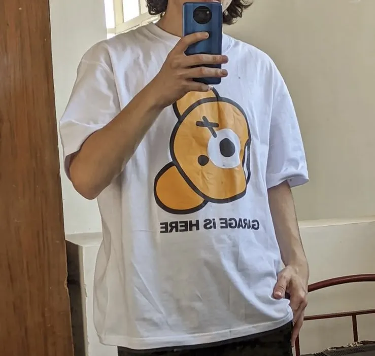 Remera blanca con estampa de oso marca GARAGE.  Talle M  nueva en su bolsita y con etiqueta 🏷️.  (unisex )